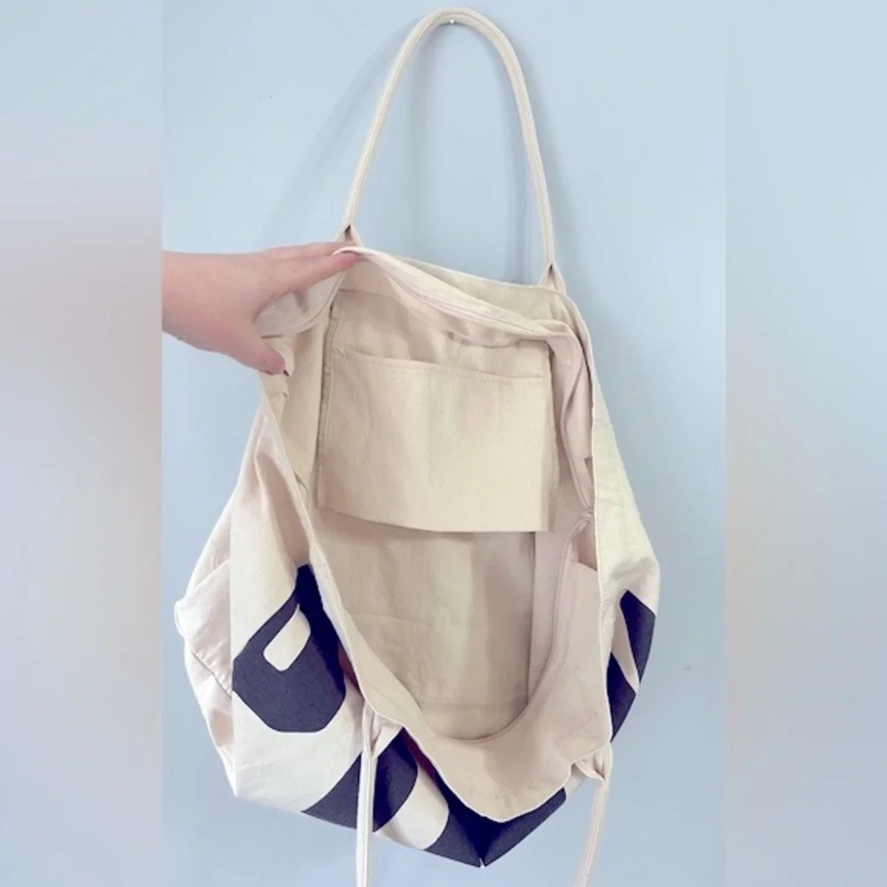 NWT PINK Victoria’s Secret Large Canvas Tote Duffel Bag Cream w/Black print. - Picture 10 of 11